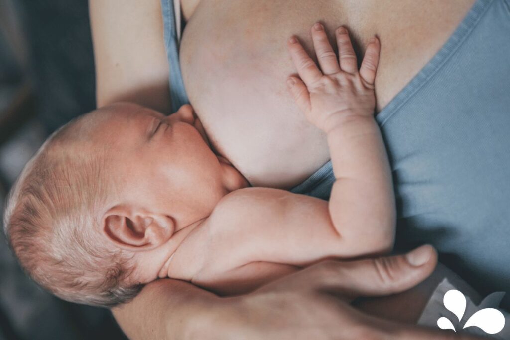 Baby breastfeeding with a good latch.